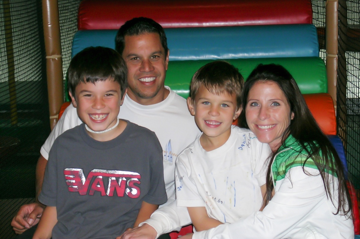 Jodi and Rob Eichensehr with their two boys inside the Safari Run play structure, 2006